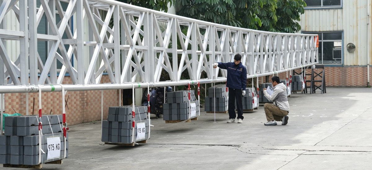 Load capacity test on truss system spanning multiple sections
