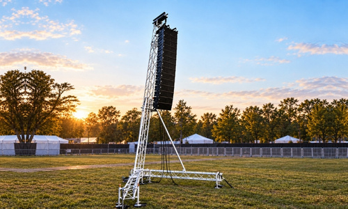 Line array speaker system truss tower configured to lift and support